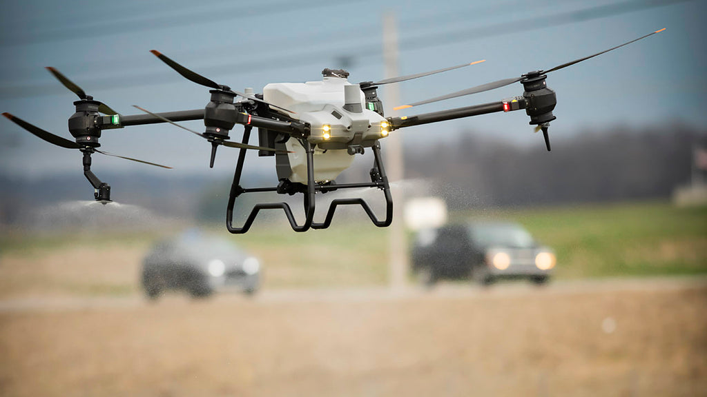 DJI Agras T40 Flying Over Field